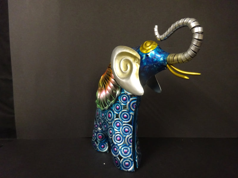A hand painted metal Standing elephant figurine